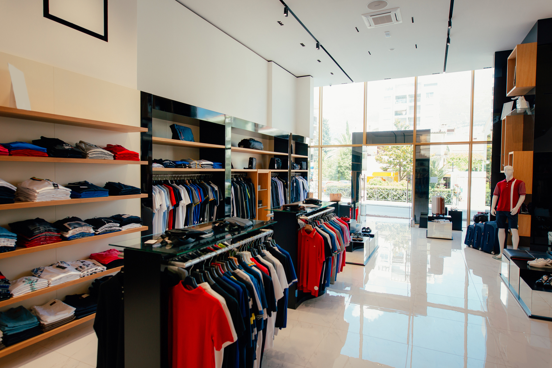 Interior of a Clothing Store. Clothing for Men and Women on the